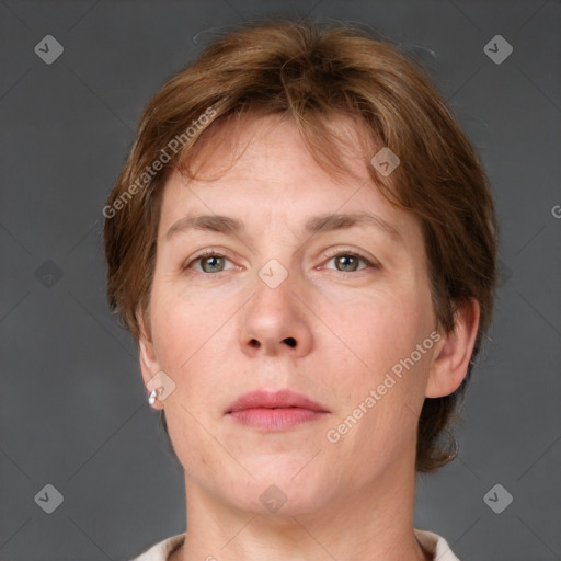 Neutral white adult female with short  brown hair and grey eyes