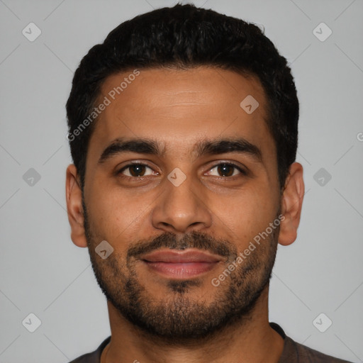 Joyful latino young-adult male with short  black hair and brown eyes