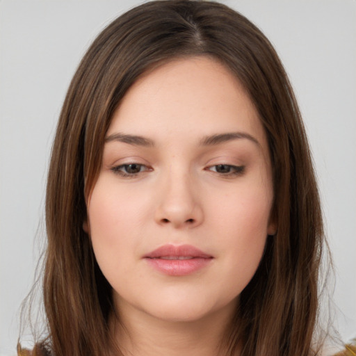 Neutral white young-adult female with long  brown hair and brown eyes