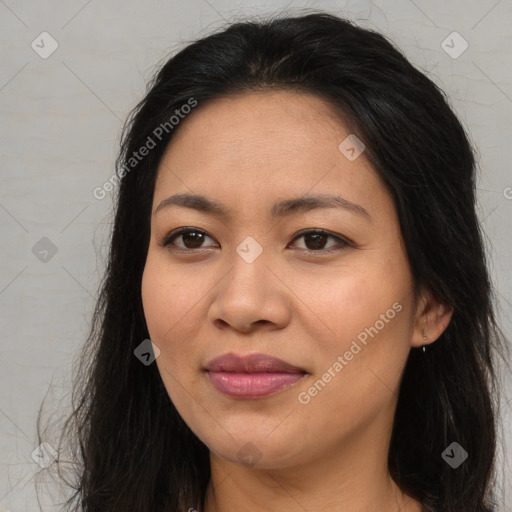 Joyful asian young-adult female with long  brown hair and brown eyes