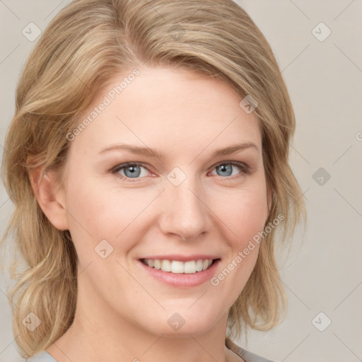 Joyful white young-adult female with medium  brown hair and blue eyes