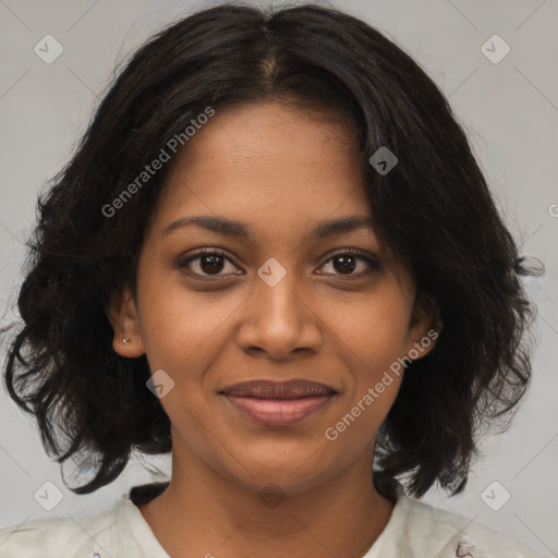 Joyful black young-adult female with medium  brown hair and brown eyes