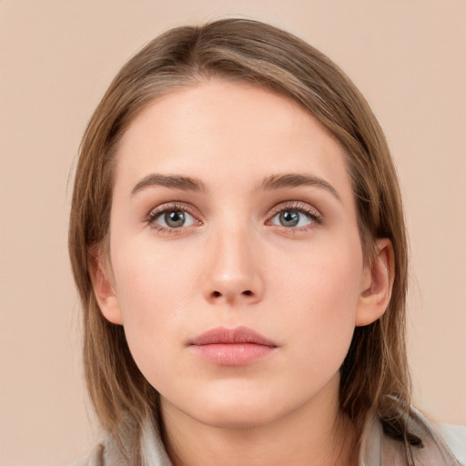 Neutral white young-adult female with medium  brown hair and grey eyes