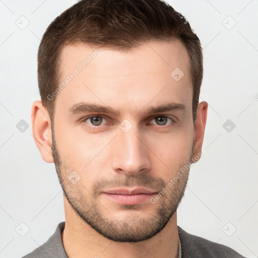 Neutral white young-adult male with short  brown hair and grey eyes