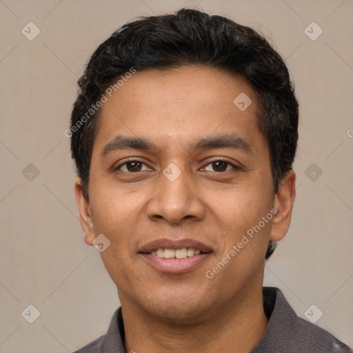 Joyful white young-adult male with short  black hair and brown eyes