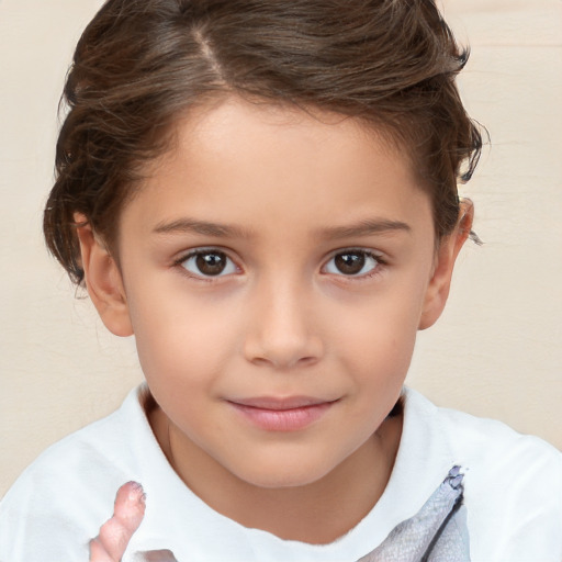 Joyful white child female with short  brown hair and brown eyes