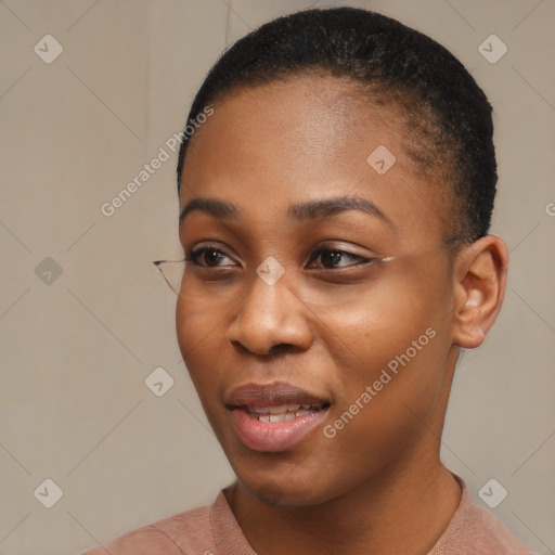 Joyful black young-adult female with short  black hair and brown eyes