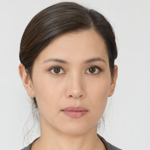 Neutral asian young-adult female with medium  black hair and brown eyes