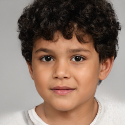 Joyful white child male with short  brown hair and brown eyes