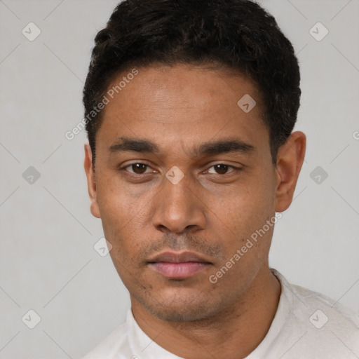 Neutral latino young-adult male with short  black hair and brown eyes
