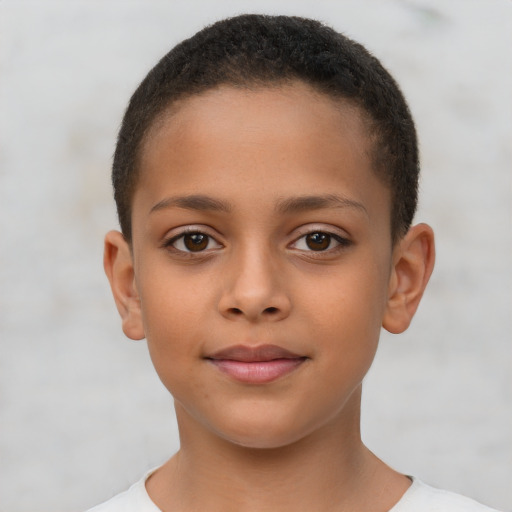 Joyful latino child female with short  brown hair and brown eyes