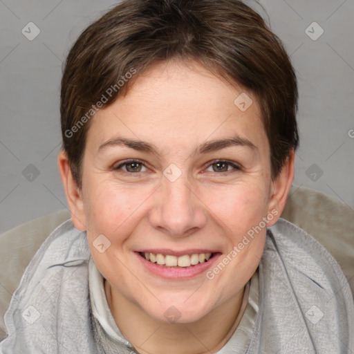 Joyful white adult female with medium  brown hair and brown eyes