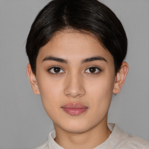 Neutral latino young-adult female with short  brown hair and brown eyes