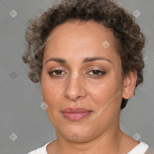 Joyful white adult female with short  brown hair and brown eyes