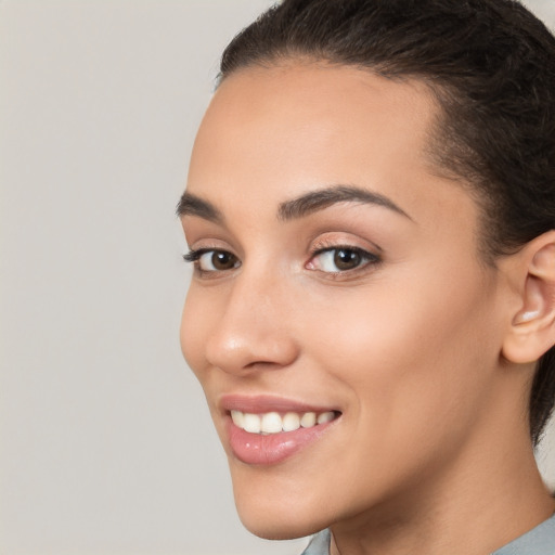 Joyful white young-adult female with medium  brown hair and brown eyes