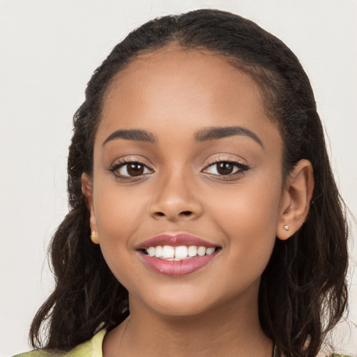 Joyful latino young-adult female with long  brown hair and brown eyes