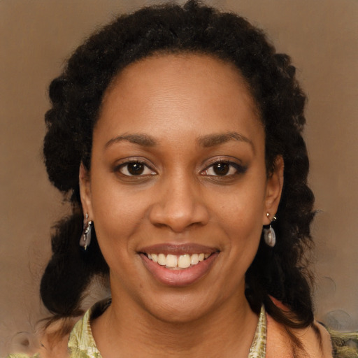 Joyful black young-adult female with medium  black hair and brown eyes