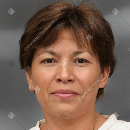 Joyful white adult female with short  brown hair and brown eyes