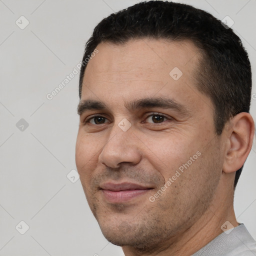 Joyful white adult male with short  brown hair and brown eyes