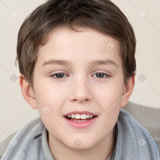 Joyful white child male with short  brown hair and brown eyes