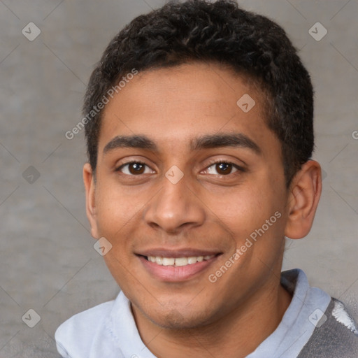 Joyful latino young-adult male with short  brown hair and brown eyes