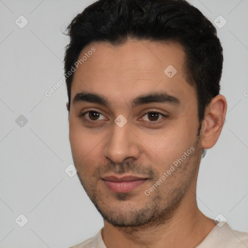 Neutral latino young-adult male with short  black hair and brown eyes