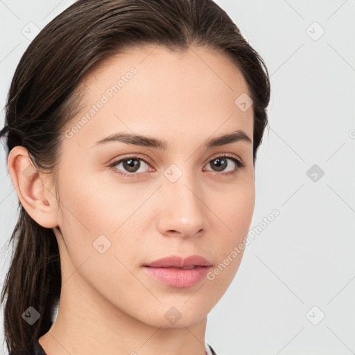 Neutral white young-adult female with long  brown hair and brown eyes