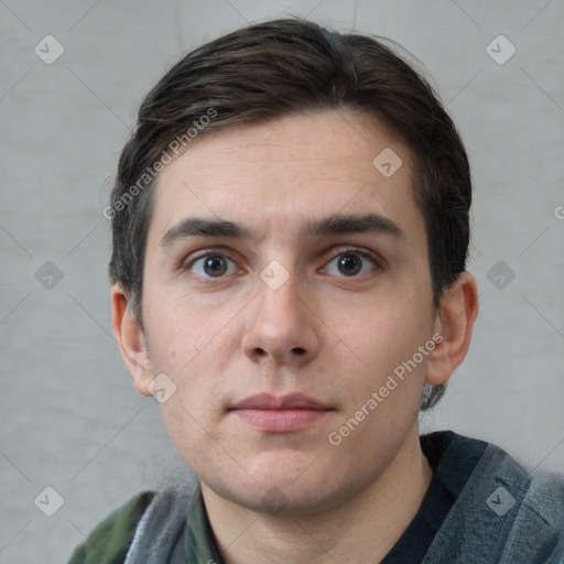 Neutral white young-adult male with short  brown hair and grey eyes