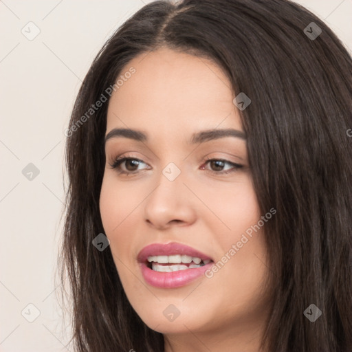 Joyful white young-adult female with long  black hair and brown eyes