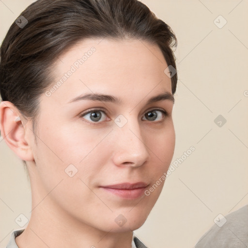 Neutral white young-adult female with short  brown hair and brown eyes