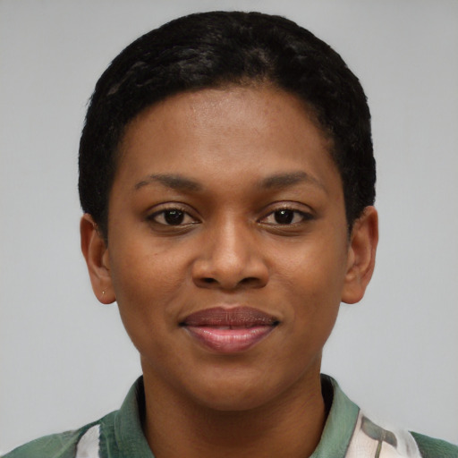 Joyful black young-adult female with short  black hair and brown eyes