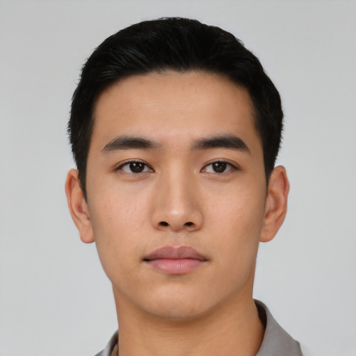 Neutral asian young-adult male with short  black hair and brown eyes