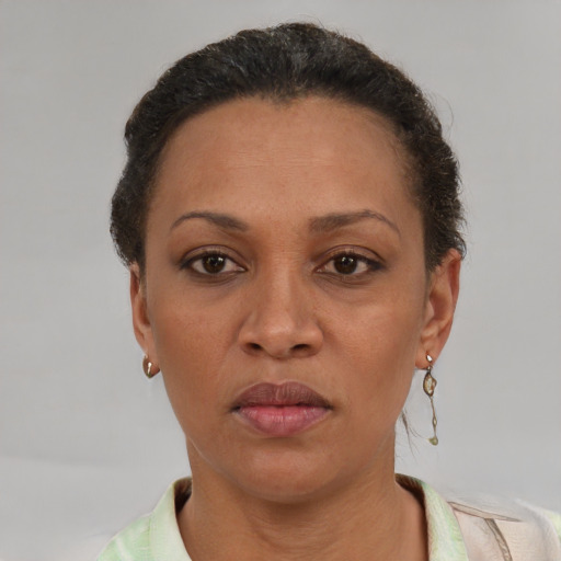 Neutral black adult female with short  brown hair and brown eyes