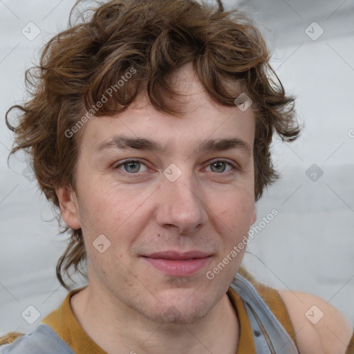 Joyful white young-adult male with medium  brown hair and brown eyes