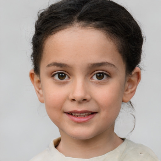 Joyful white child female with medium  brown hair and brown eyes