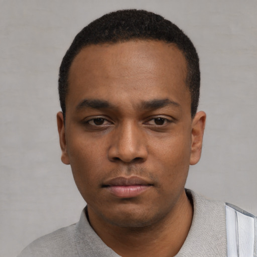 Neutral black young-adult male with short  black hair and brown eyes
