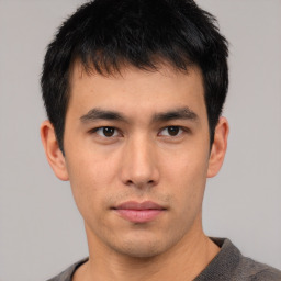 Neutral asian young-adult male with short  black hair and brown eyes