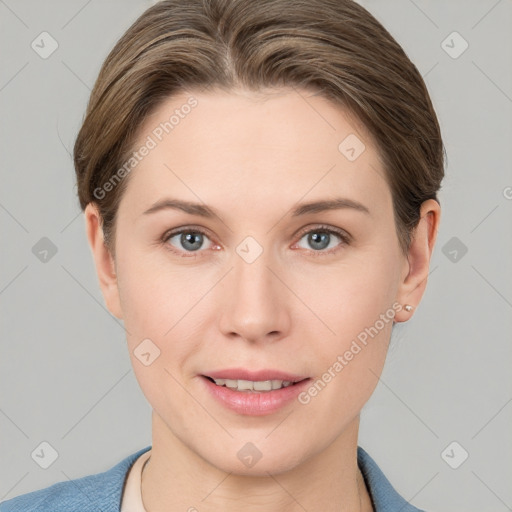 Joyful white young-adult female with short  brown hair and grey eyes