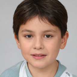 Joyful white child female with short  brown hair and brown eyes