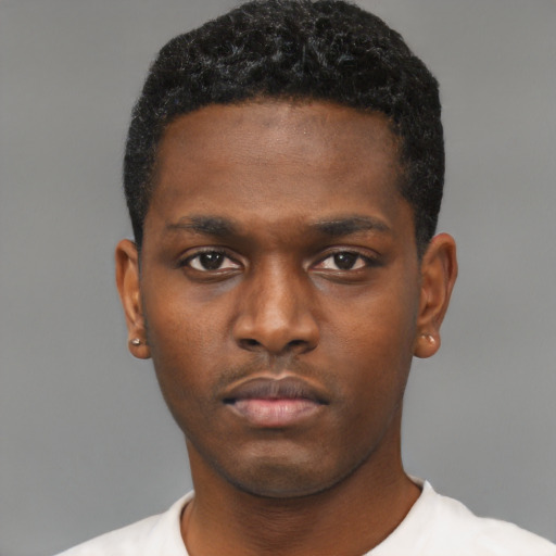Neutral black young-adult male with short  brown hair and brown eyes
