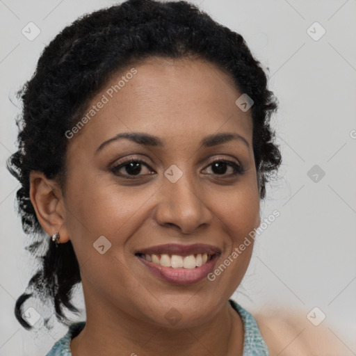 Joyful black young-adult female with medium  brown hair and brown eyes