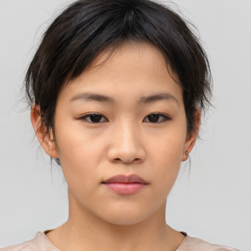 Neutral asian young-adult female with medium  brown hair and brown eyes