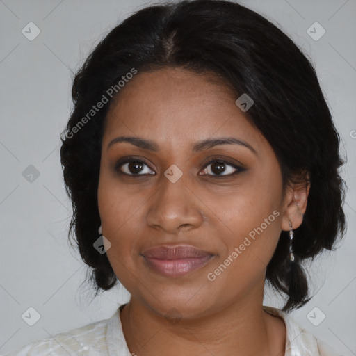 Joyful black young-adult female with medium  black hair and brown eyes