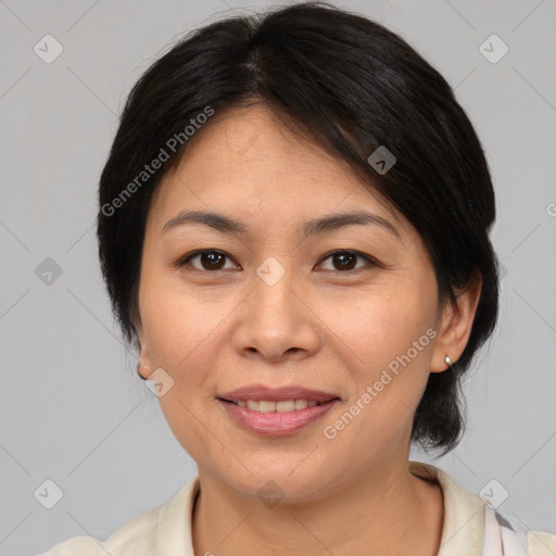 Joyful white adult female with medium  brown hair and brown eyes