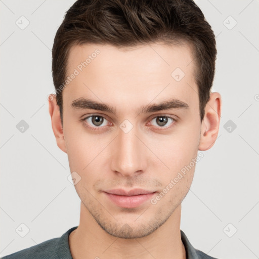 Neutral white young-adult male with short  brown hair and brown eyes