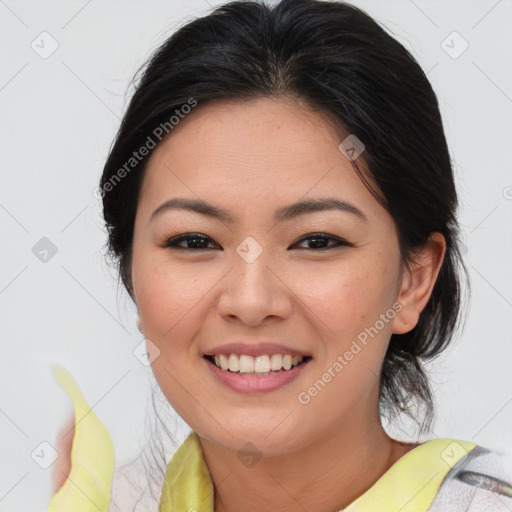 Joyful asian young-adult female with medium  brown hair and brown eyes