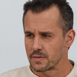 Neutral white adult male with short  brown hair and brown eyes