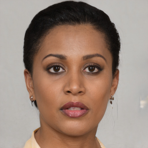 Neutral latino young-adult female with short  brown hair and brown eyes