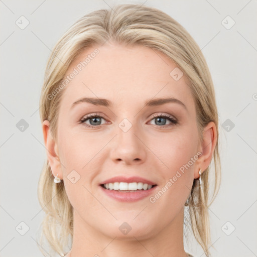 Joyful white young-adult female with medium  brown hair and blue eyes