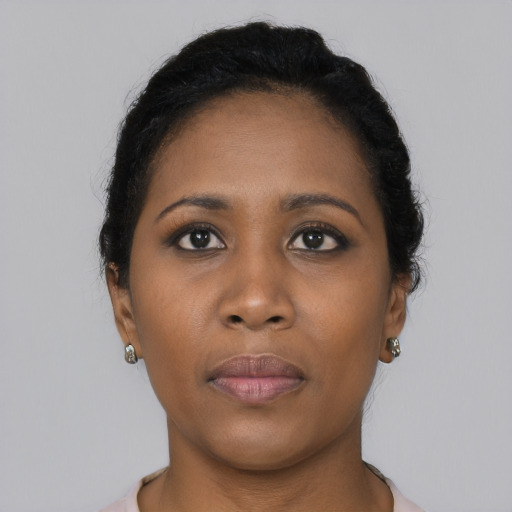 Neutral black young-adult female with short  black hair and brown eyes
